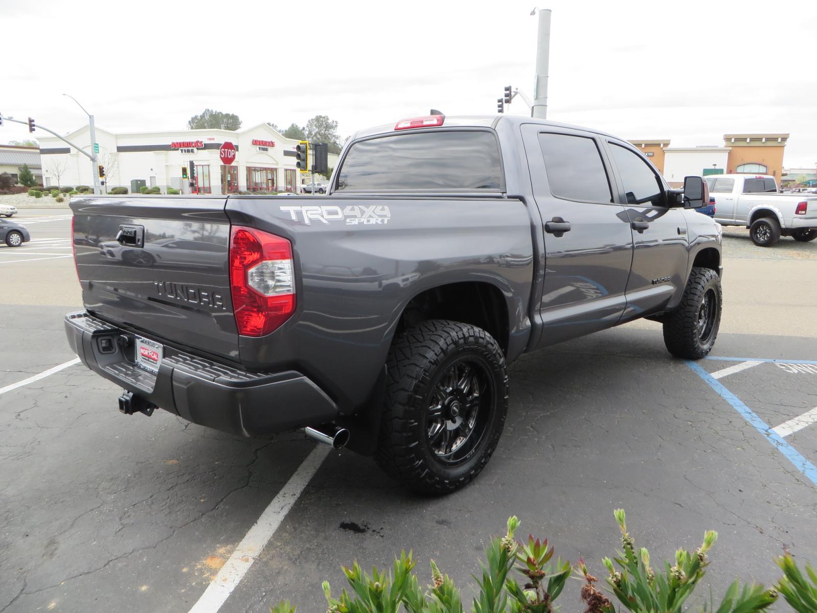 2021 CHARCOAL /GREY Toyota Tundra SR5 (5TFDY5F16MX) with an 5.7L V8 OHV 16V engine, automatic transmission, located at 2630 Grass Valley Highway, Auburn, CA, 95603, (530) 508-5100, 38.937893, -121.095482 - Features a Zone Offroad level kit, 20" SOTA wheels, 35" Nitto Ridge Grappler tires, Fox rear shocks, Air bags, front and rear TRD sway bars, and Window tint. - Photo #4
